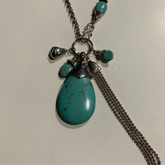 Silver tone and turquoise necklace with oversized pendant and charms. - Picture 7 of 8